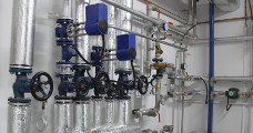Heat exchangers, heat distribution centres, automatic control
